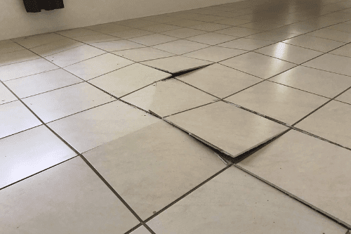 What Causes Water Damage Under Tiles? - Kings Of Steam Carpet Cleaning